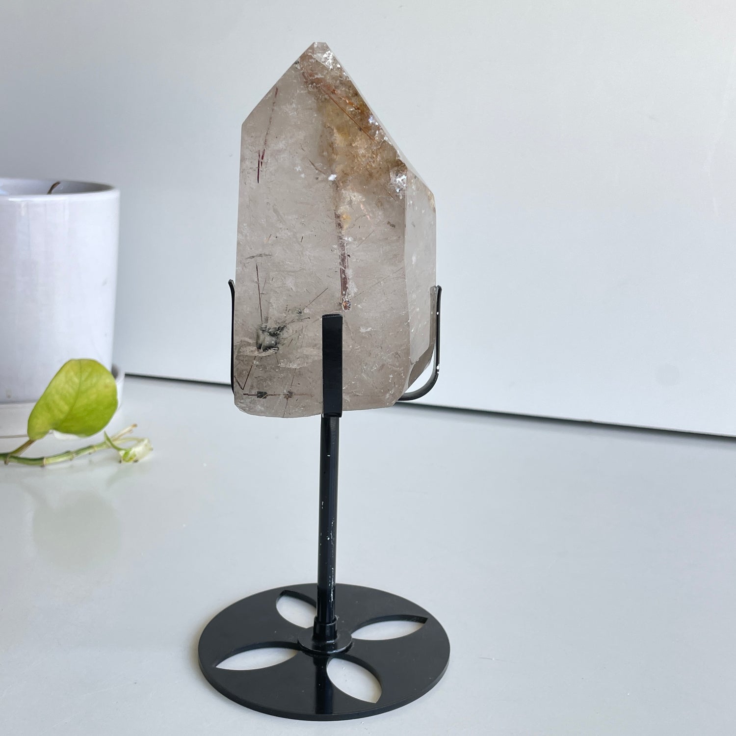 Clear Quartz With Rutile Point In Stand 11.8cm
