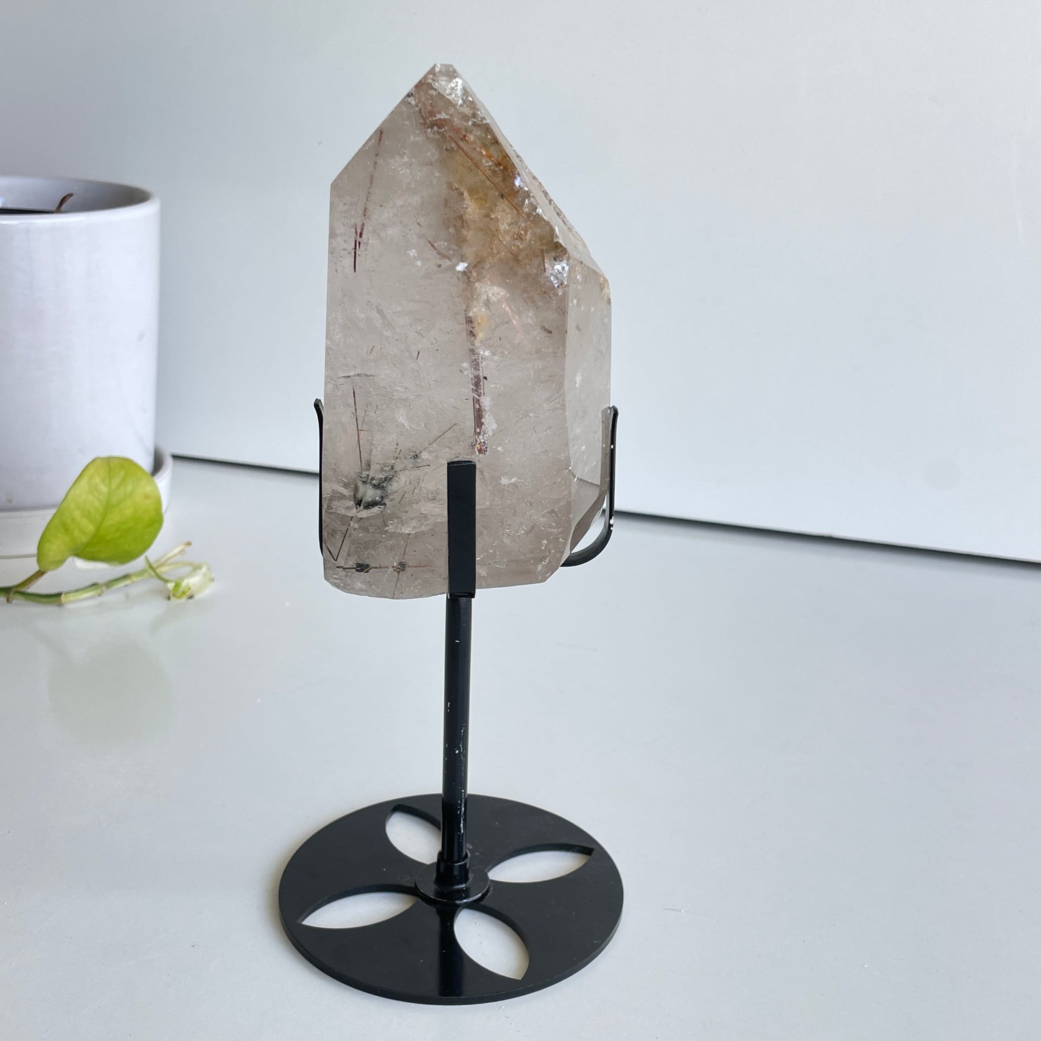 Clear Quartz With Rutile Point In Stand 11.8cm