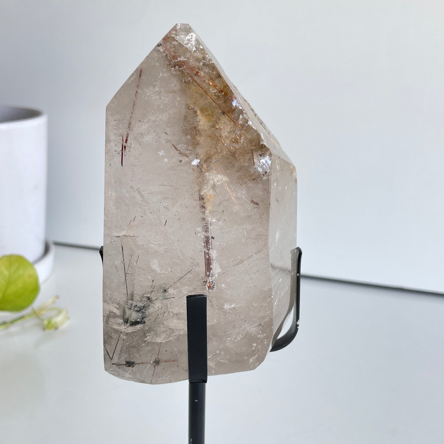 Clear Quartz With Rutile Point In Stand 11.8cm