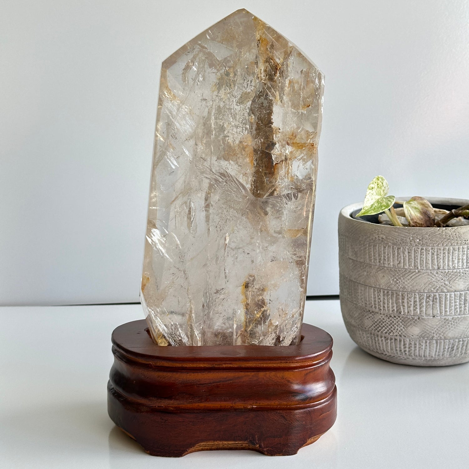 Clear Quartz With Iron Inclusions Point In Stand 26cm