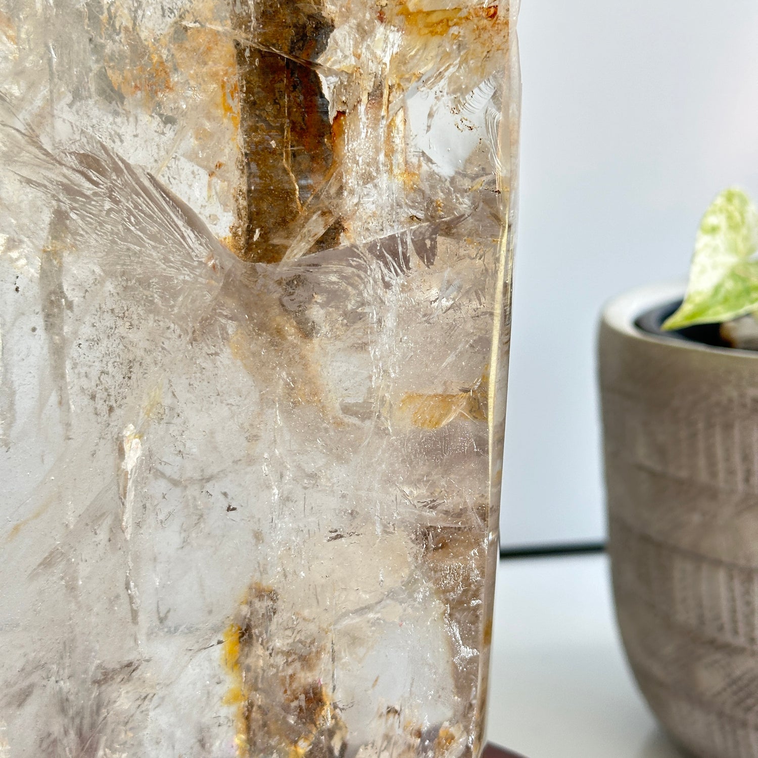 Clear Quartz With Iron Inclusions Point In Stand 26cm