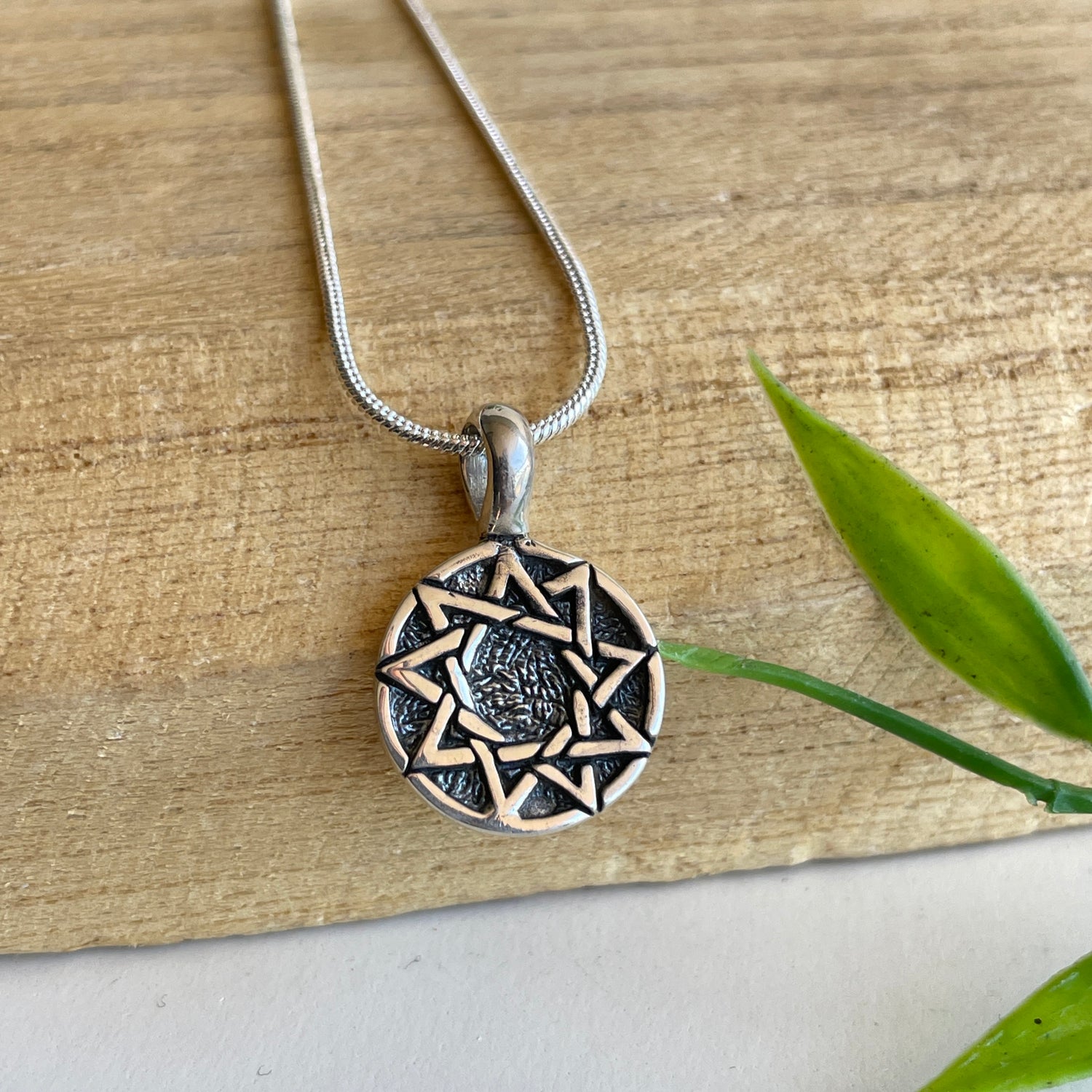 9 Pointed Star Pendant