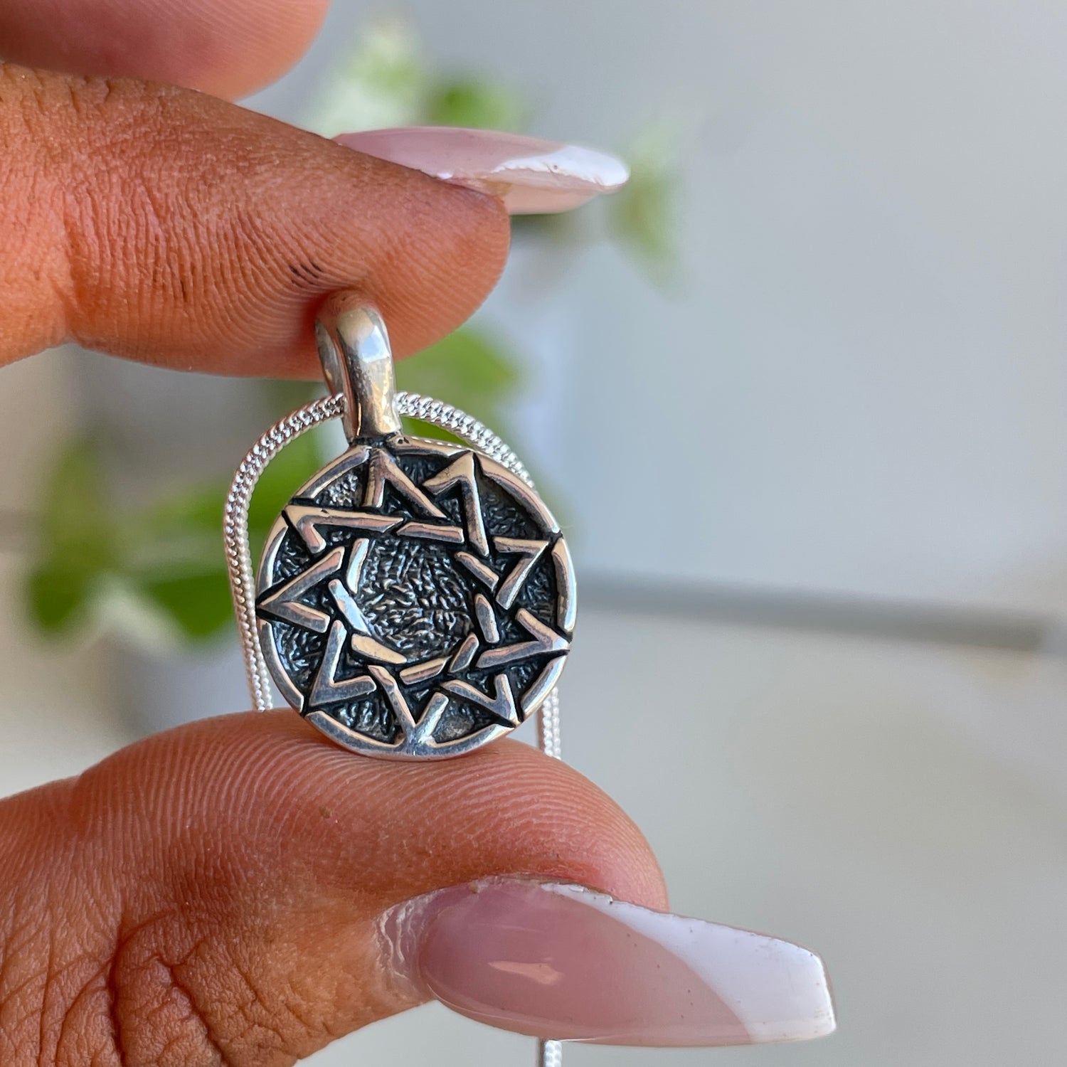 9 Pointed Star Pendant