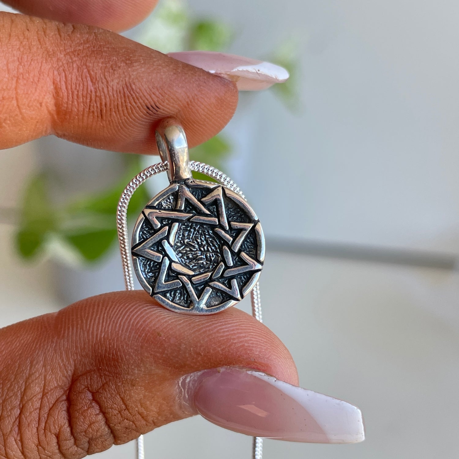9 Pointed Star Pendant