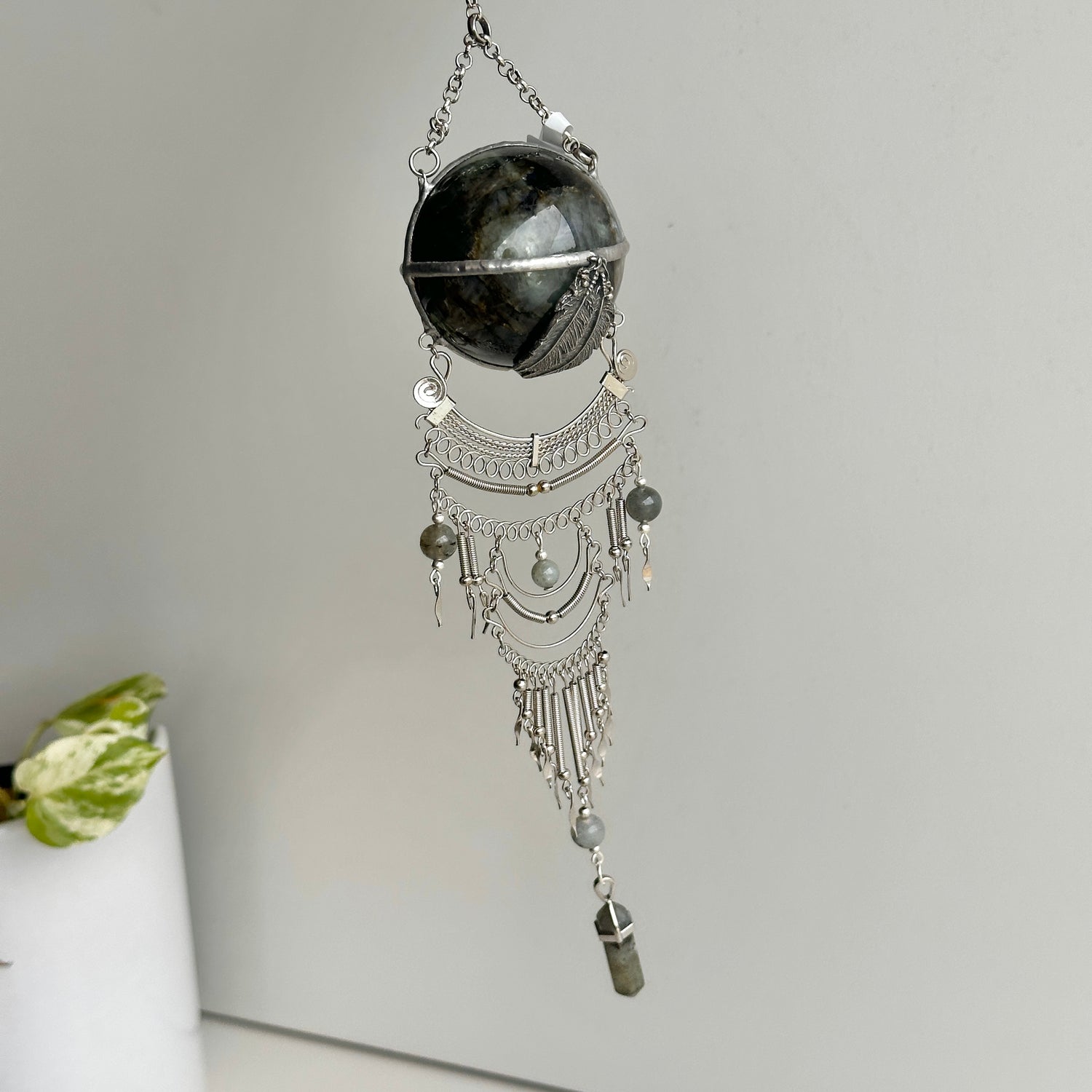 Labradorite Sphere Hanging With Feathers