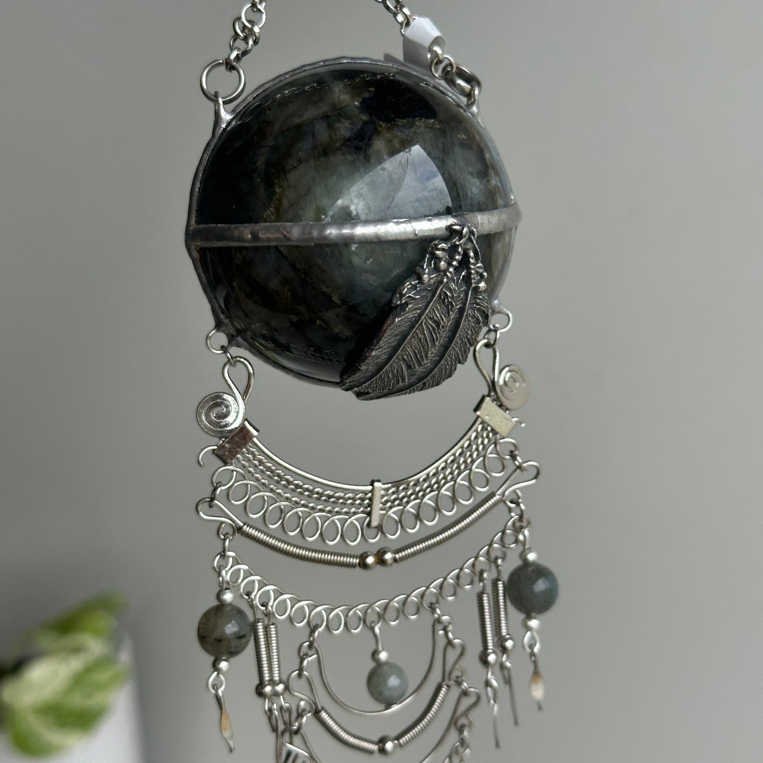 Labradorite Sphere Hanging With Feathers