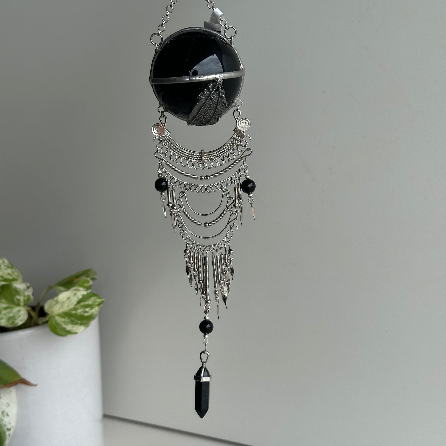 Black Obsidian Sphere Hanging Feathers