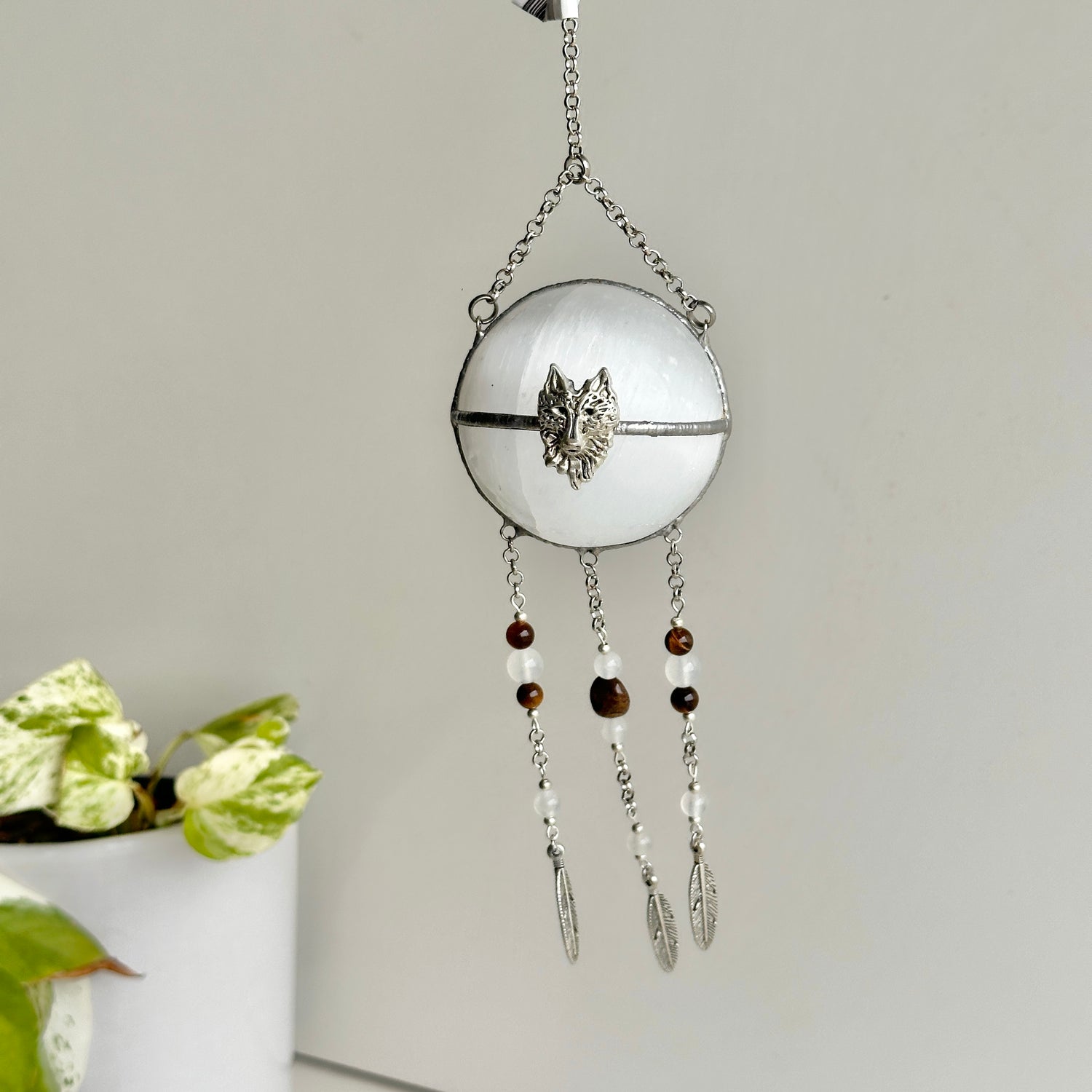 Selenite Sphere Hanging With Wolf