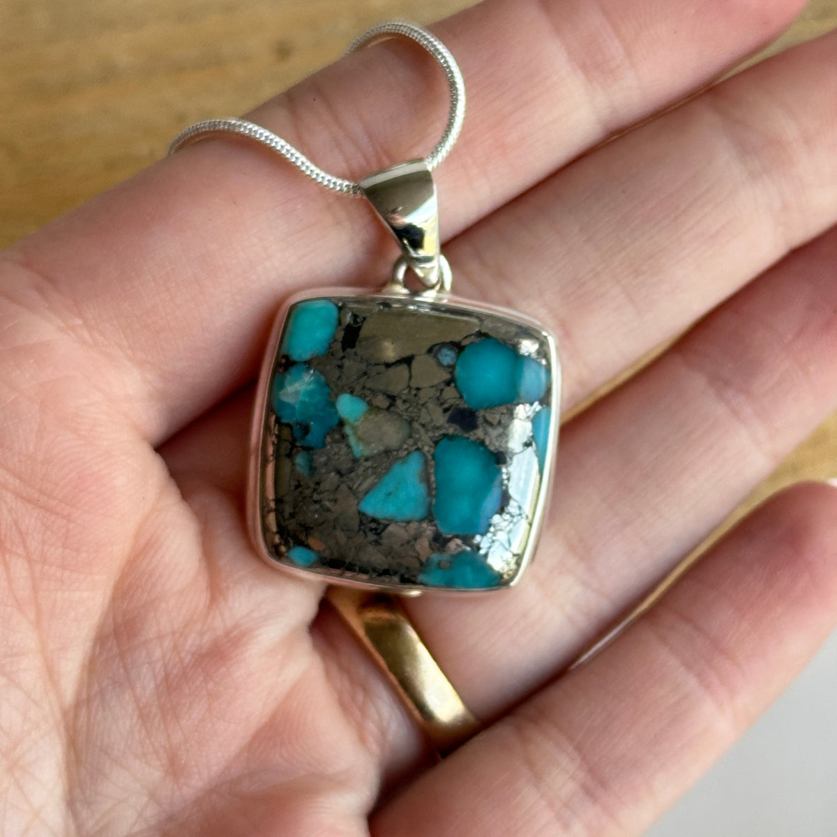 Turquoise With Copper Pendant